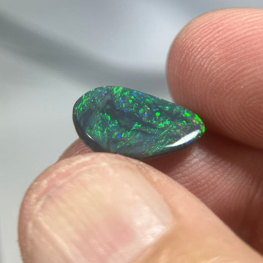 Lightning Ridge gem quality semi-black solid opal. Ready to make into that perfect ring or pendant. Beautiful greens and blues with a hint of reds.