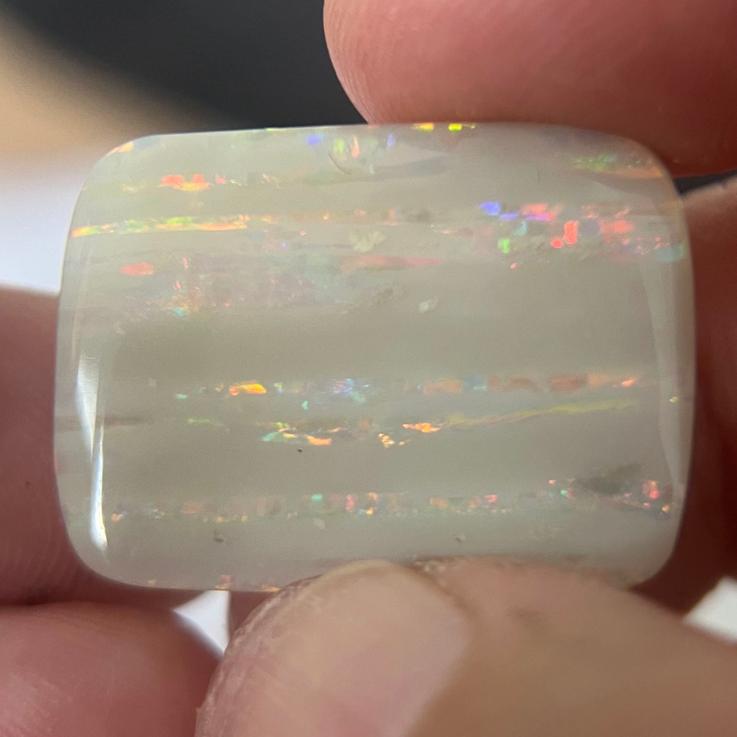 Large vertical Grawin displaying lines of magnificent colours. Can be cut or made into a huge pendant, or just kept for a perfect specimen.