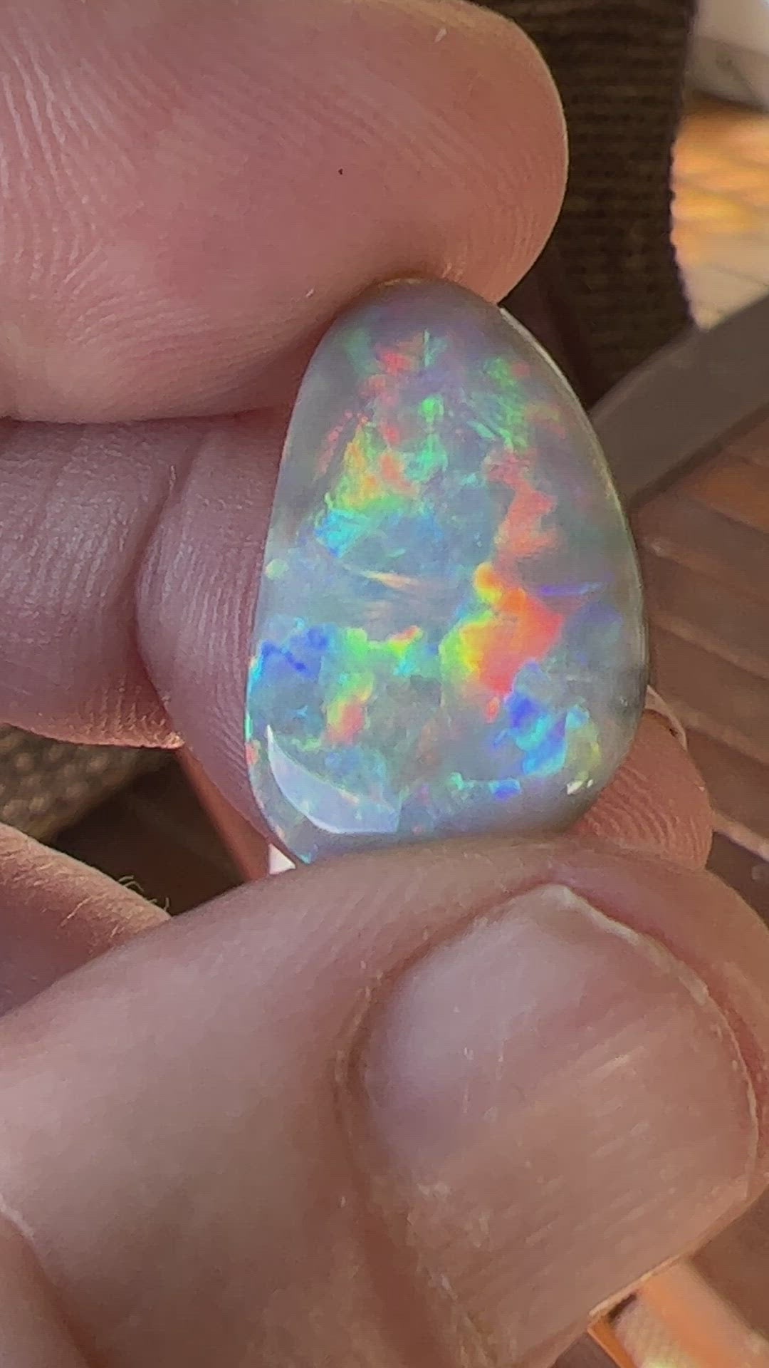 Solid Mintabie black opal. Beautiful specimen displaying a magnificent play of colour.
