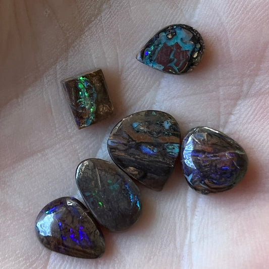 Six lovely boulder opals. Great little coloured pieces.