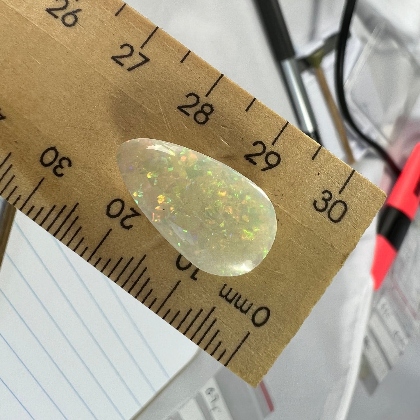 Perfect double sided pin fire solid white opal. Pear shaped and ready to go.