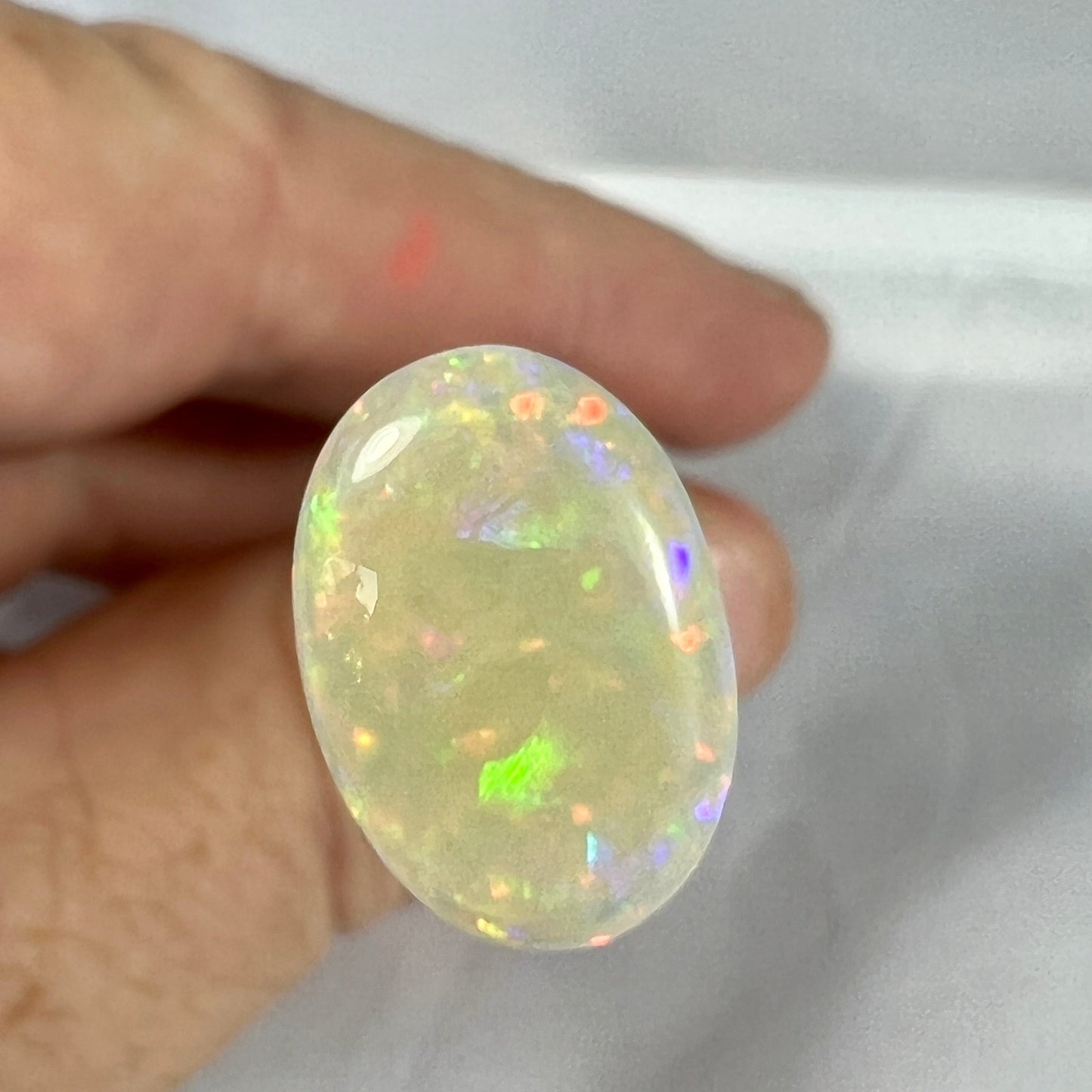 Absolute gem of a Coober Pedy opal. Perfectly cut and polished, displaying all colours.