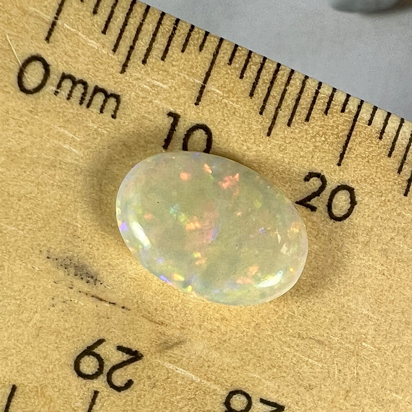 Absolute gem of a Coober Pedy opal. Perfectly cut and polished, displaying all colours.