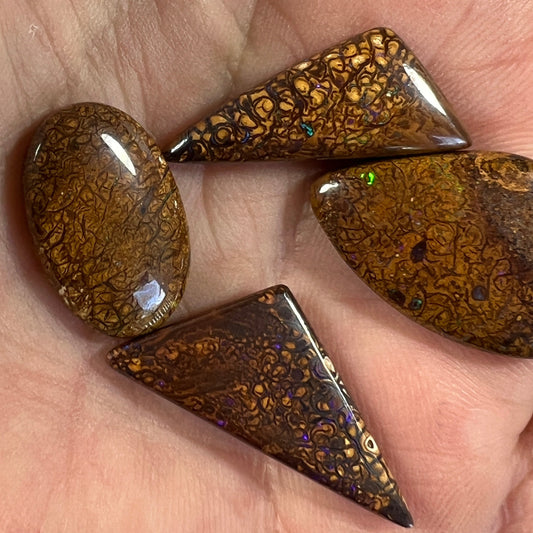 Four lovely Winton bolder opals, with great cut and polish. Bright colours with rolling flash.
