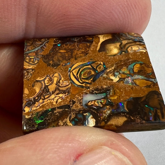 Square cut boulder opal from Winton, displaying great colours and pattern.