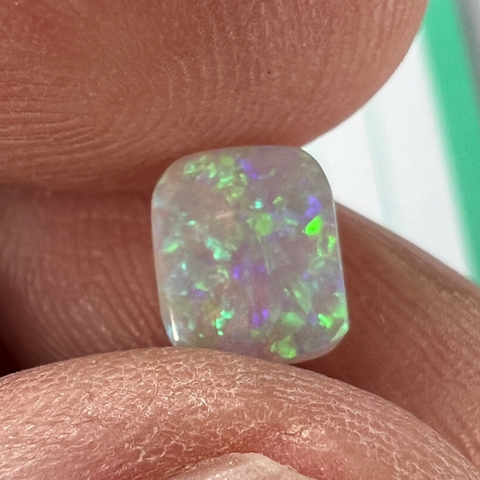 Lovely little Lightning Ridge crystal opal, cut just right for a ring.