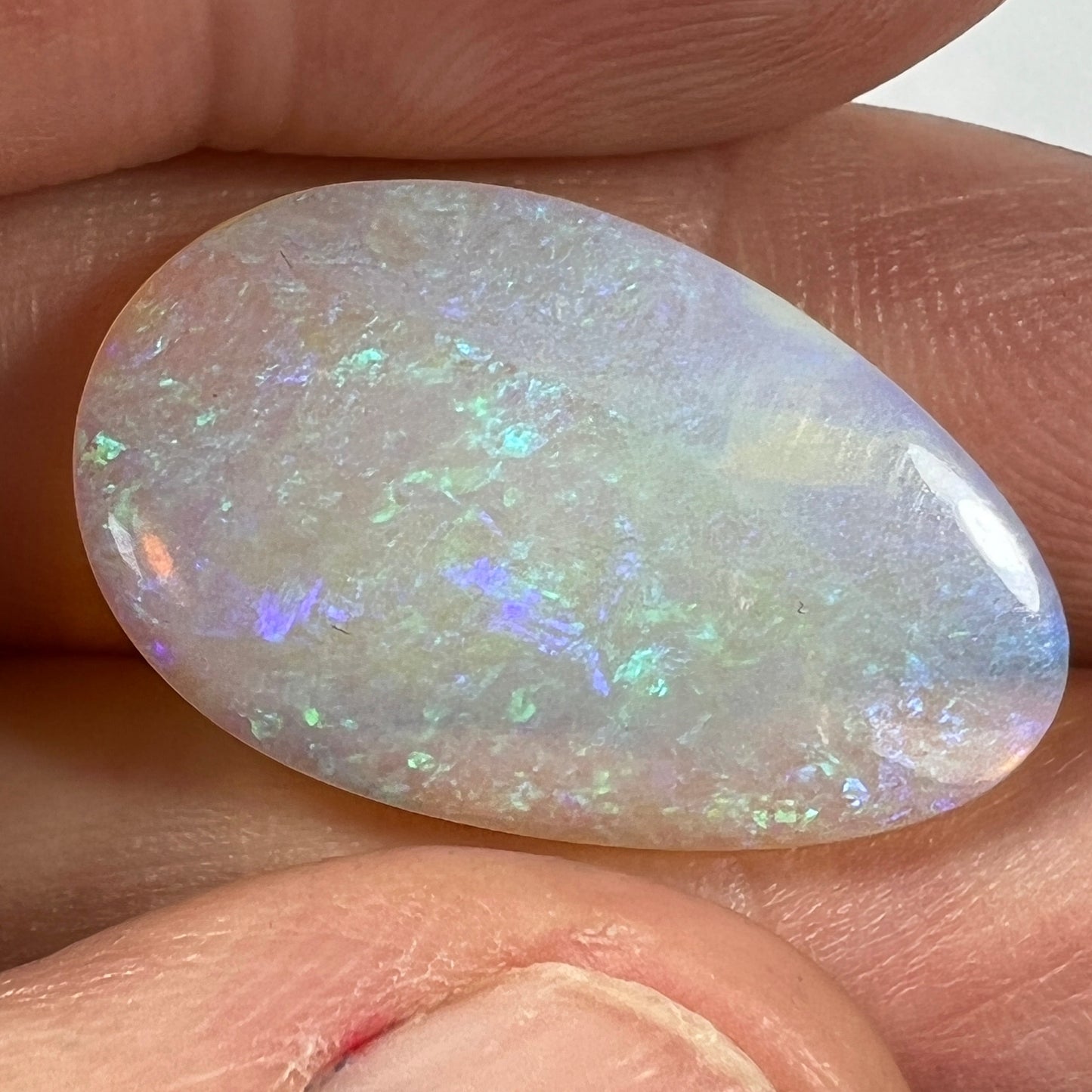 You will not find a better Lightning Ridge crystal opal than this one. Expertly cut and polished by Bill Johnston. Ready to go.