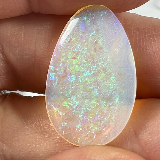You will not find a better Lightning Ridge crystal opal than this one. Expertly cut and polished by Bill Johnston. Ready to go.