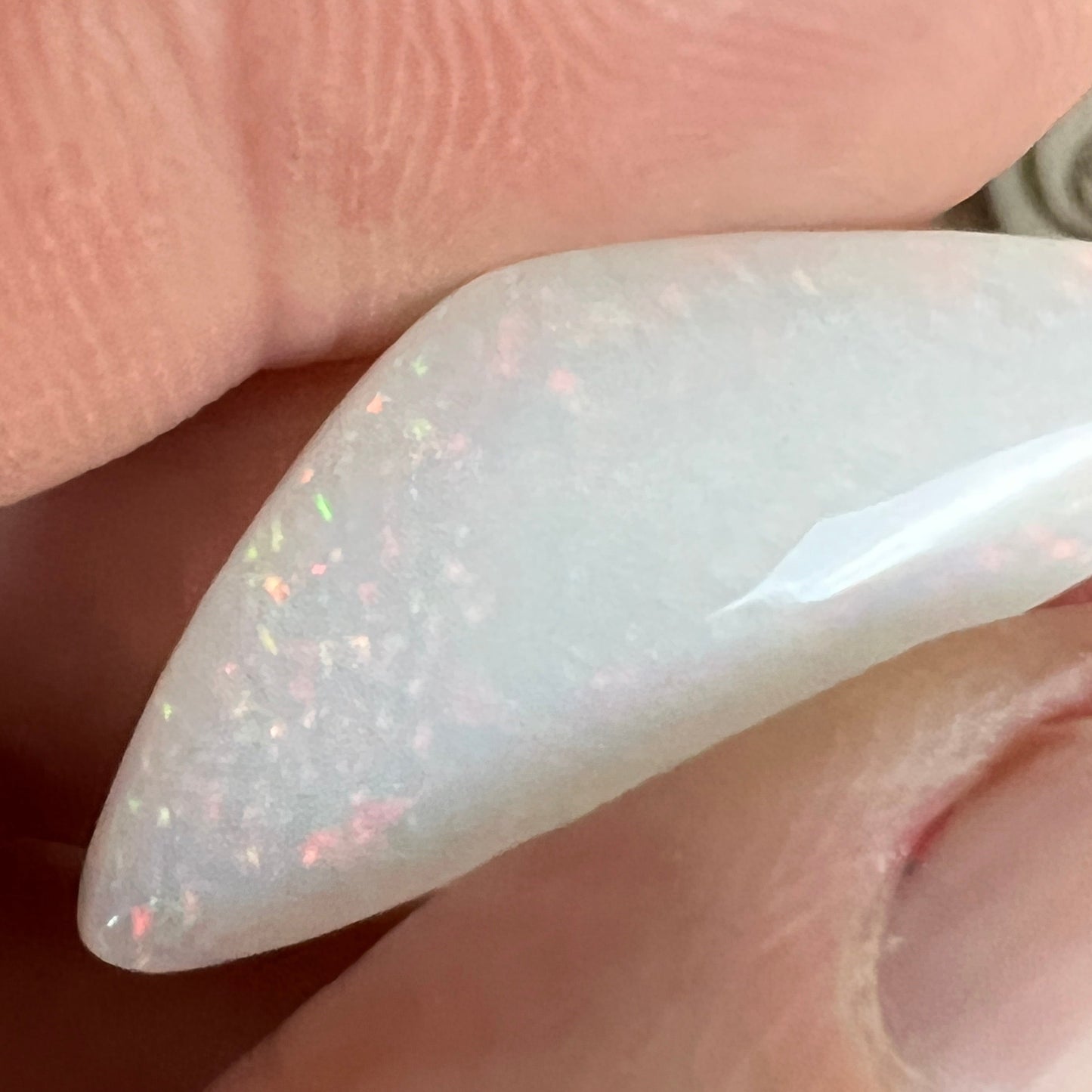 Nice piece of 19ct pin fire Coober Pedy opal, beautifully polished showing flashes of most colours. Polished by Bill Johnson.