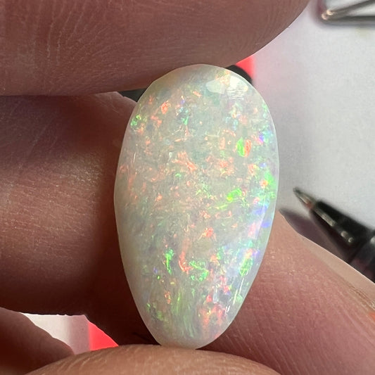 Wonderful pin fire Coober Pedy solid white opal. Bright and beautifully cut by Bill Johnson.