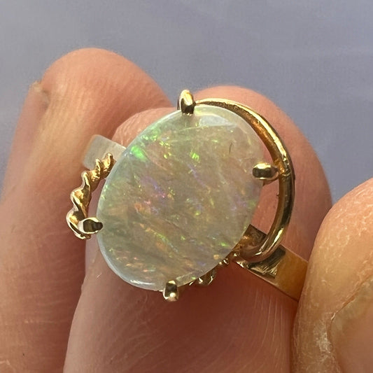 Nice bespoke Coober Pedy crystal opal set in 14ct gold with a twist!