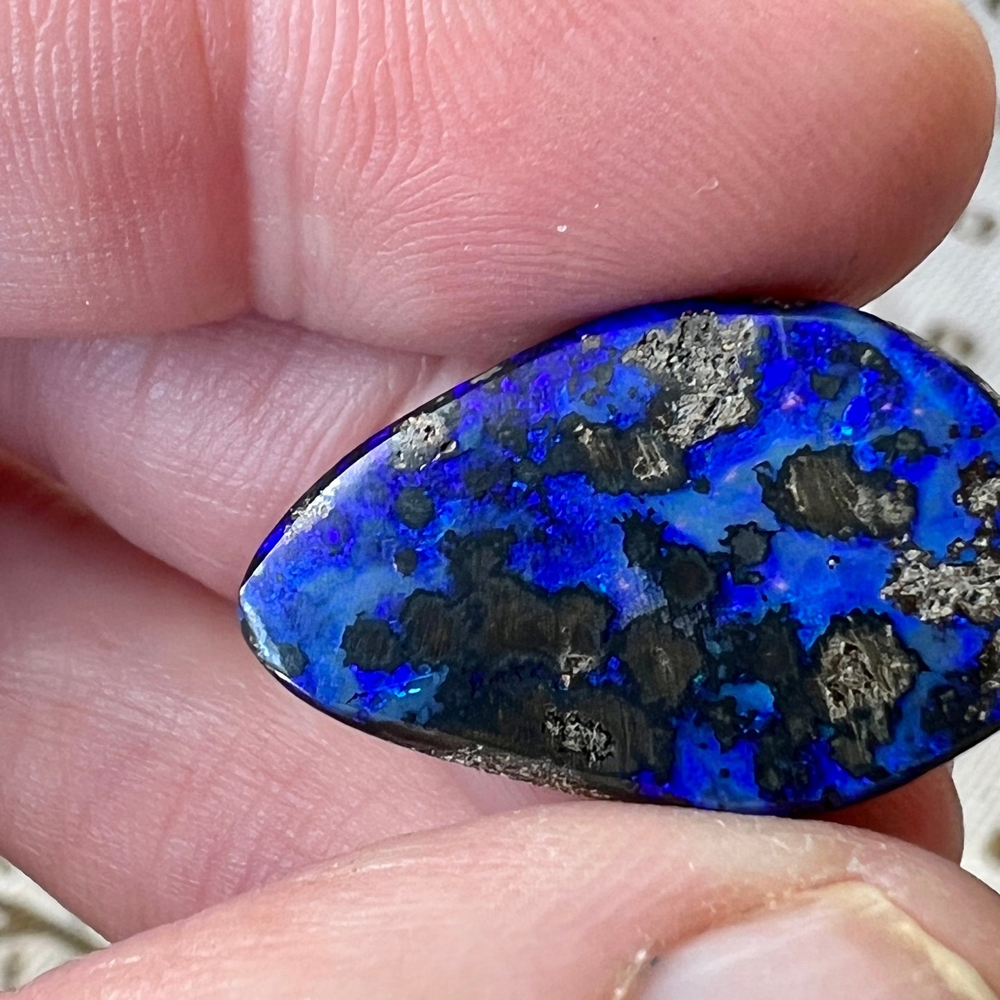Stunning blues in this Winton boulder opal. Ready to set. Would make a great pendant.