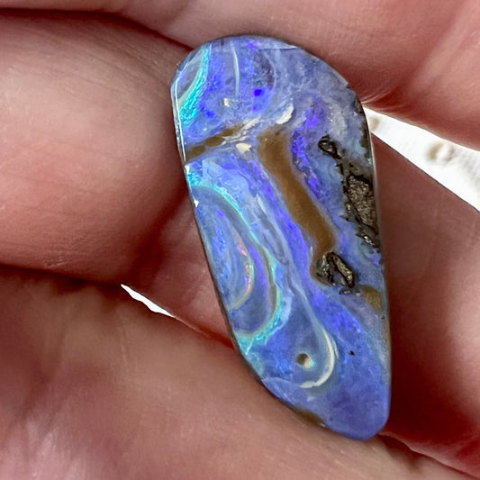 Bright and bold colours and awesome patterns in this beautiful piece of boulder opal from Winton. Nicely polished and a perfect pendant.