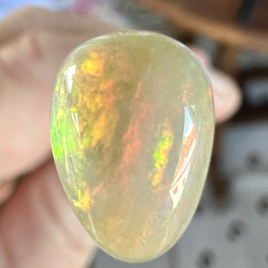 Nice little 2ct Lightning Ridge opal. Perfect shape and cut for mounting. Very nice colours.