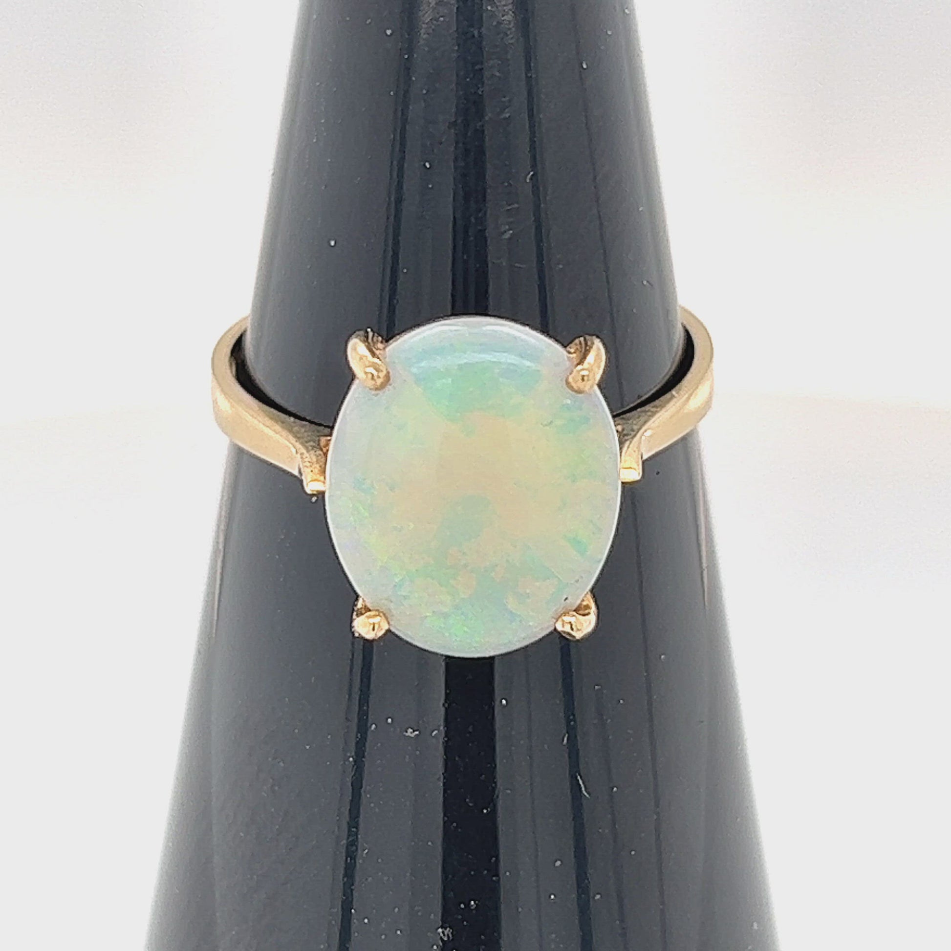Stylish simple 14ct gold and opal ring. Great greens in this Coober Pedy crystal opal.
