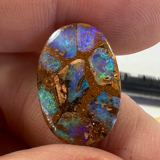 Beautiful boulder opal from Winton. Really unusual stone. Will make a wonderful pendant.