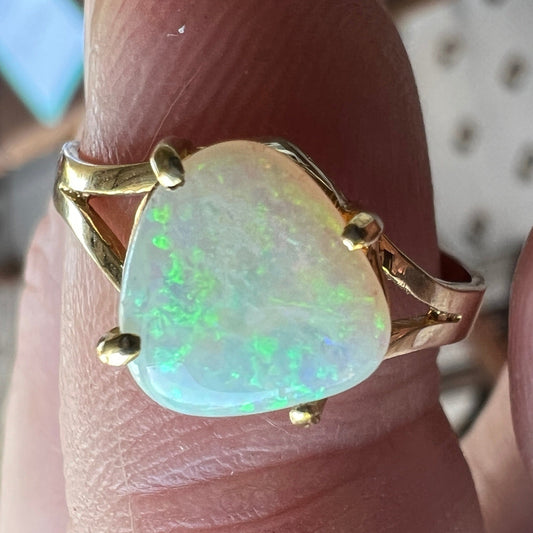 Great Coober Pedy Crystal opal set in 14ct gold ring. Nice shape and beautiful colours.